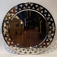 Front view of the polished stainless steel tray showing reflective surface and triangular perforations on rim
