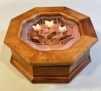Top angled view of the octagon solid wood jewelry box showing stained glass tulip design.