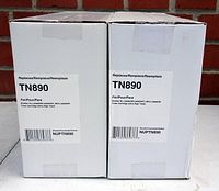 Two white boxes containing Brother TN890 black toner cartridges by NuPrint, each box labeled with model TN890, part NUPTN890, compatible with specified Brother printers.