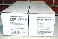 Two white boxes of HP 304A CC530A black toner cartridges with NuPrint branding and part numbers visible on labels.