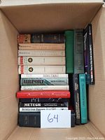 Box with collection of 17 hardcover books of various subject matter