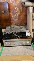 Both Yamaha CR-420 receiver and Toshiba XR-9219 CD player stacked, top surfaces dusty