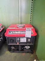 Front view of the Storm Cat portable generator showing the outlets and start switch with paper tag.