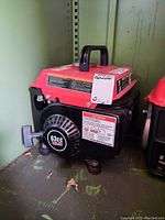 Image of the side of the generator showing the pull start labeled 63cc Gasoline Engine 2 HP.