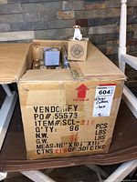 Closed cardboard box labeled for Stone Critters animal collection.