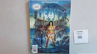 Front cover of the 1997 Heavy Metal 20 Year Special magazine showing a futuristic female warrior in armor against a mechanical backdrop with title and special edition text.
