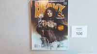 Front cover image of Heavy Metal magazine, Digitized Special Fall 2005 issue, featuring a fantasy illustration of a woman with a mechanical arm.