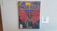Front cover of the Heavy Metal Presents Moebius comic book showing distinctive colored artwork and title.
