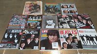 Overview of 12 Beatles-themed magazines including Rolling Stone, Life, Vintage Guitar, and Music Icons featuring various Beatles cover stories and photographs.