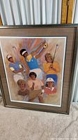 Full view of framed print showing six female golfers in various poses, with frame and matting visible.