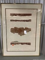 Framed art print by Sheila Maki including signature, numbering, and title visible on art paper beneath mat in simple gold frame.