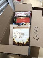 Box with 7 books including Diana The Untold Story, Barefoot Contessa, The Bipolar Child