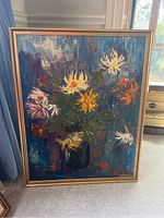 Full front of framed oil painting of chrysanthemums
