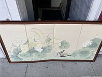 Front view of the four-panel folding screen showing lotus flowers and ducks artwork.