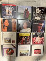 Photo 1 shows 12 CDs including Enchanted Melody, Charlotte Church, Gene Pitney, Greensleeves, and Beethoven.