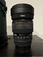 Front view of Sigma 15-30mm lens showing zoom and focus rings with focal length scale.