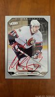 Front of autographed Andrej Meszaros hockey card showing player image and signature.