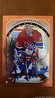 Front of the Donruss Preferred Andy Moog hockey card showing the goalie in red Canadiens uniform with signed autograph at the lower half.