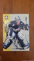 Front view of signed Carey Price hockey card showing him in goalie stance for Tri-City Americans with autograph across card.