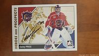 Front of Carey Price autographed hockey card showing player in action and signature