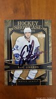 Front of signed Eric Lindros Hockey Showcase 2005-06 trading card showing player image and autograph