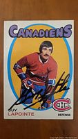 Front side of the signed Guy Lapointe Canadiens hockey card showing player image and signature.