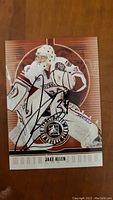 Front of Jake Allen hockey trading card signed autograph showing player in goalie uniform and signature.