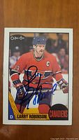 Front of Larry Robinson O-Pee-Chee hockey card with autograph visible