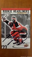 Front of the Nick Foligno Rookie Headliners signed hockey card showing player action photo and autograph.