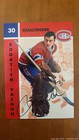 Front view of the Rogatien Vachon hockey card showing full color image, team logo, player number and autograph.