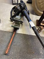 Photo showing Toro leaf blower with blower tube and handle, black color, labeled model 51591.
