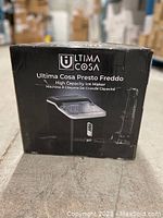 Front packaging of the Ultima Cosa Presto Freddo ice maker showing brand and model, indicating high capacity ice maker.