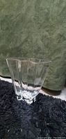 Photo of the full crystal vase showing its geometric facets and clear glass construction.
