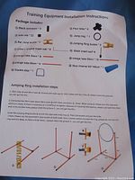 Instruction sheet detailing parts and installation steps for training equipment including bar jump, jumping ring, and round tunnel.