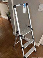Front angled view of the Polder folding aluminum stepstool, showing 3 steps and overall condition.