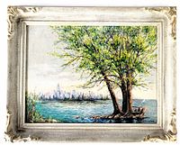 Front view of framed oil painting showing waterfront scene, trees, bench, and city skyline.