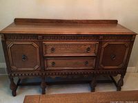 Full frontal view of sideboard showing overall design and condition