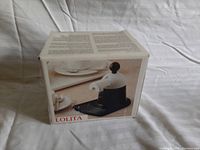 Box of Lolita espresso coffee maker showing product photo and branding.