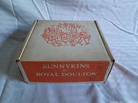 Closed original box with Bunnykins by Royal Doulton branding and illustration