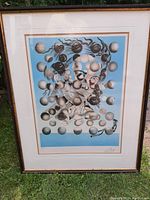 Full frontal view of framed print showing composition and frame