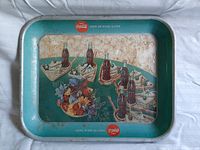 Full view of the vintage Coca-Cola serving tray showing design and overall wear.