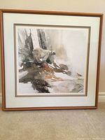 Framed and matted square artwork depicting polar bear in a natural setting.