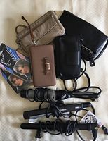 Lot assortment including 3 over-the-shoulder small purses, a small wristlet purse, two chiffon rain bonnets, and 3 hair styling tools (2 curling irons and 1 straightener)