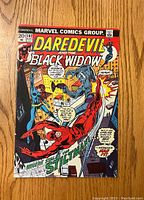 Front cover of Daredevil #102 comic showing Daredevil and Black Widow in action