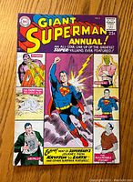 Front cover of Giant Superman Annual #2 comic showing colorful illustration of Superman flying with various villains around him and comic details.