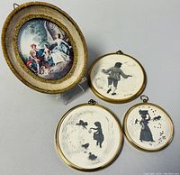 Four antique framed prints with three miniature Victorian silhouette prints and one oval Florentine print with gold trim.