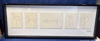 Framed print showing five abstract animal line drawings including flamingo, goat, dachshund, penguin, and bird, signed Picasso.