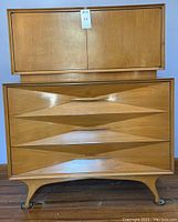 Front view of the two-tier tall boy dresser showing full appearance and drawer fronts