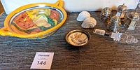 Overview of the lot with colorful Mexican pottery bowl, small pottery bowl, salt and pepper sets, Mikasa crystal bottle stopper.