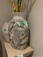 Unwrapped vase showing full winter landscape design and flared mouth